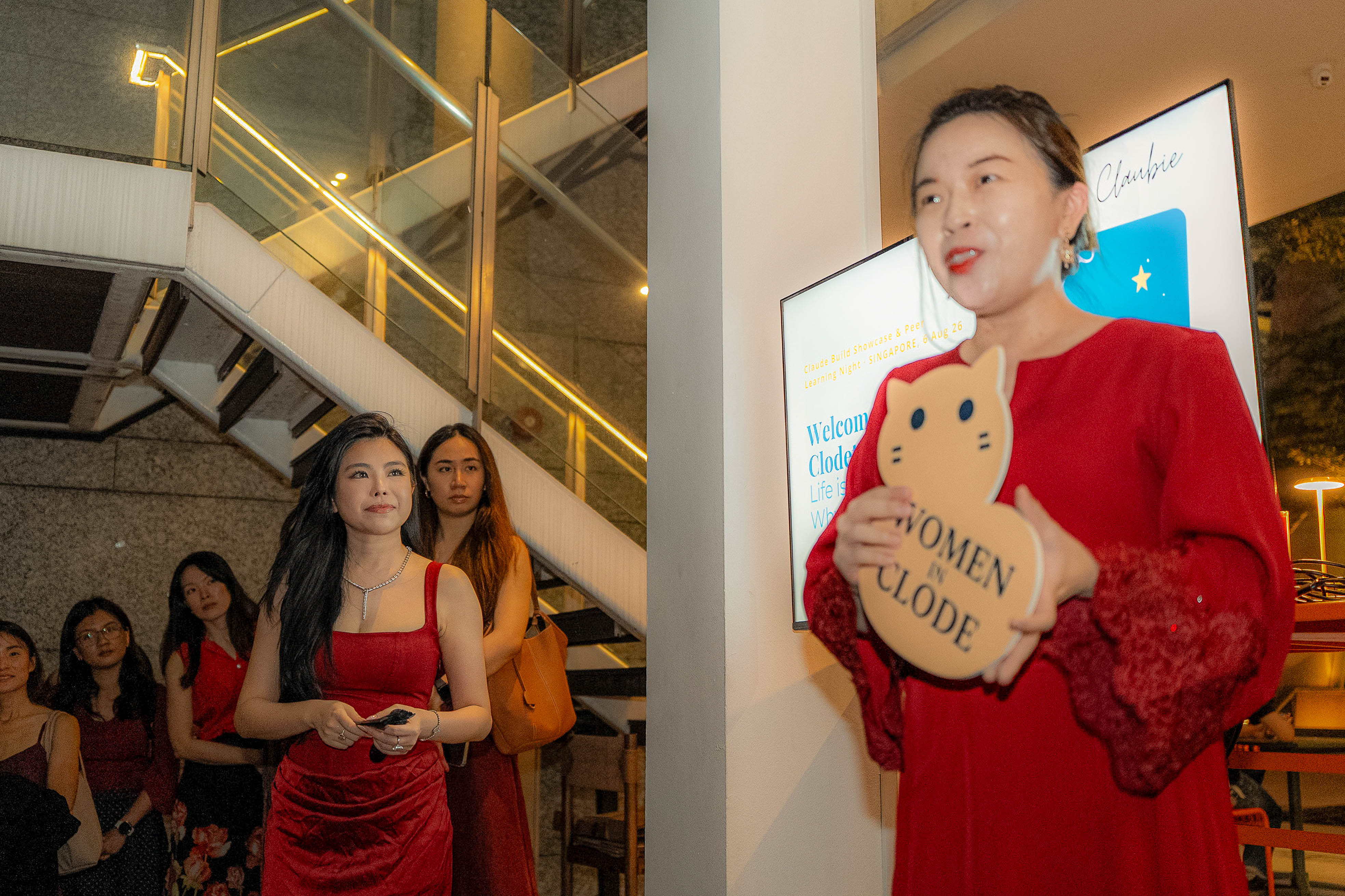 Wan Wei opening the night with the Women in Clode sign