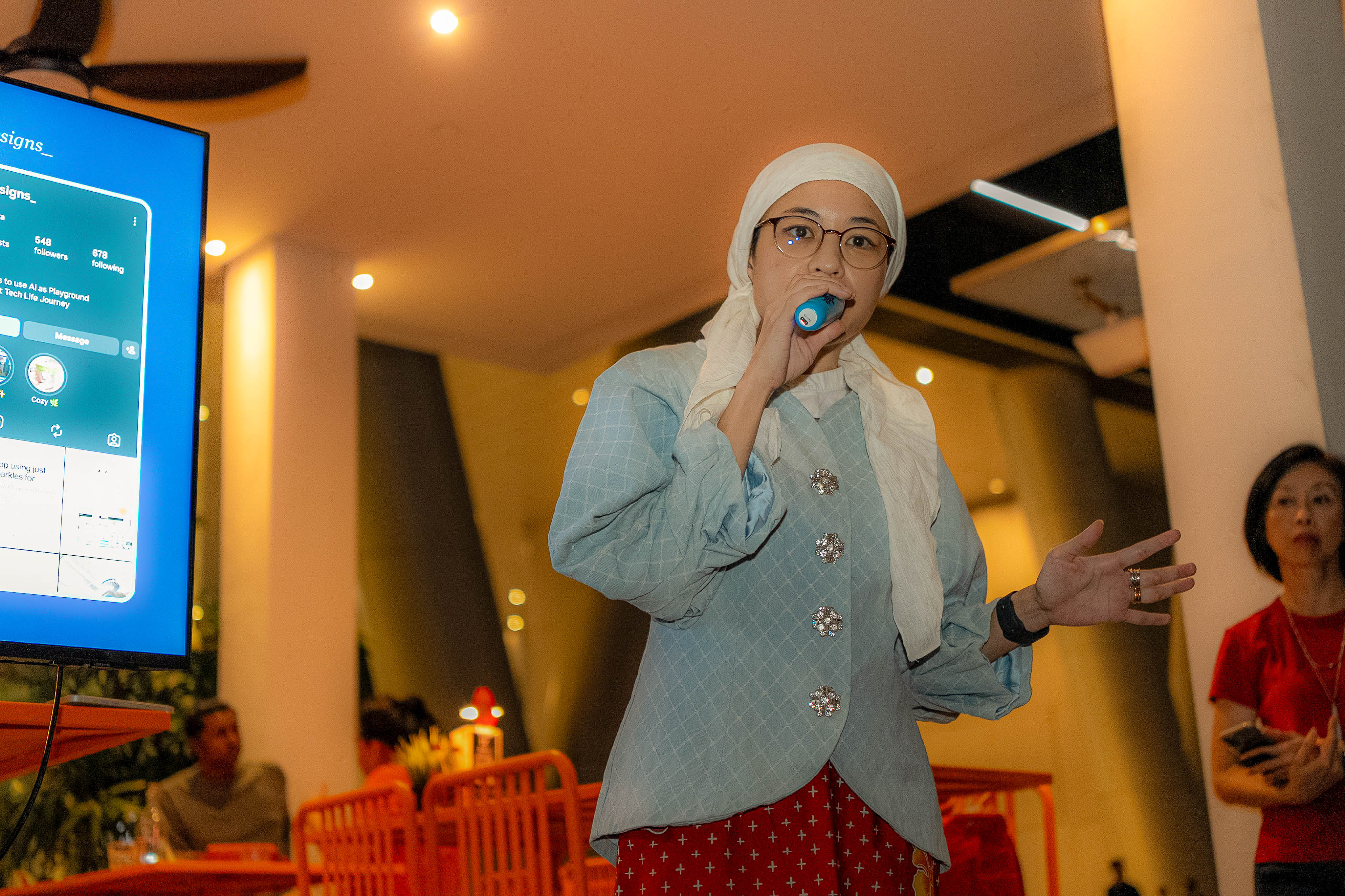 Speaking into the mic during the presentation