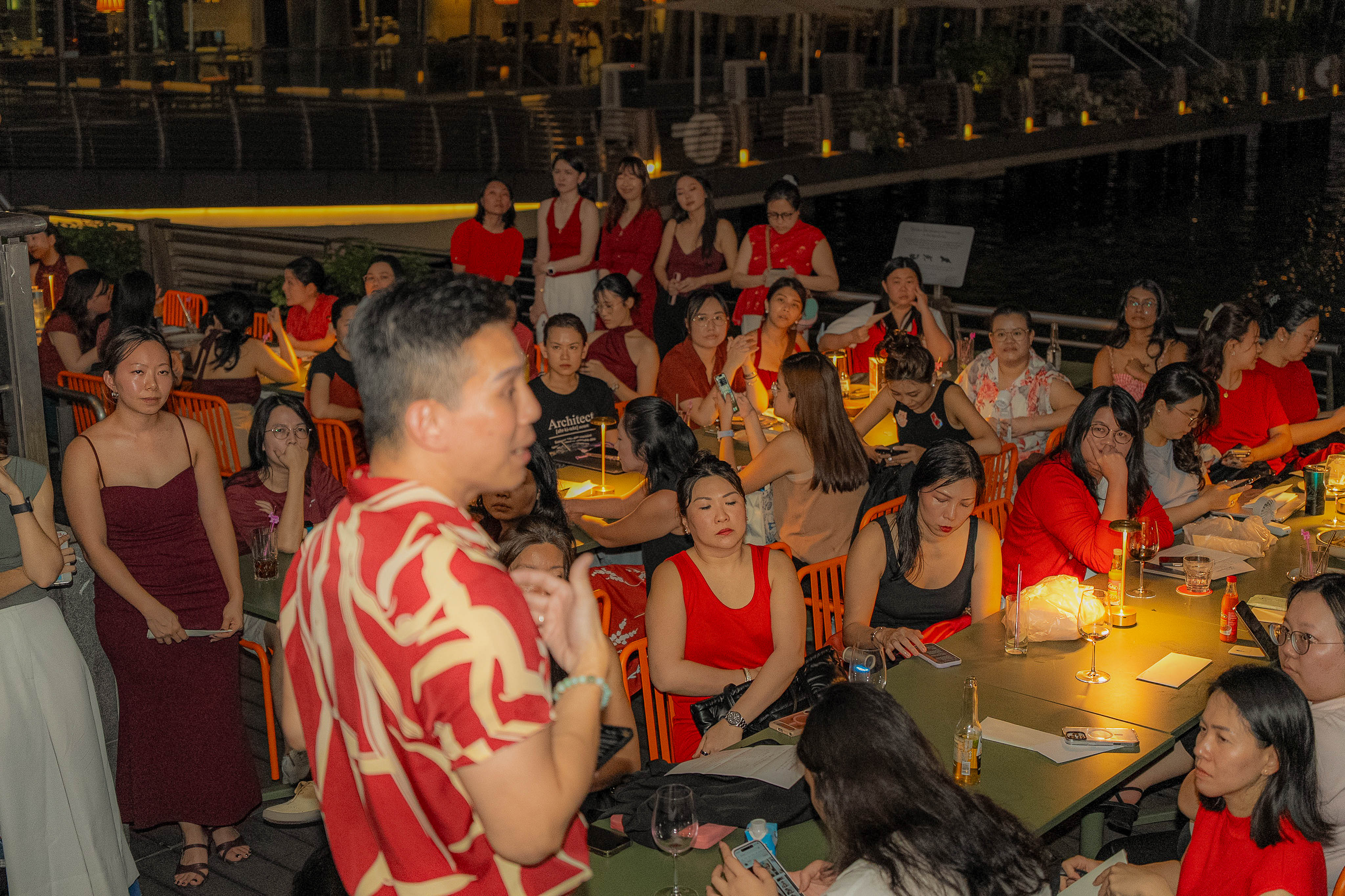 YuJin speaking among the seated guests